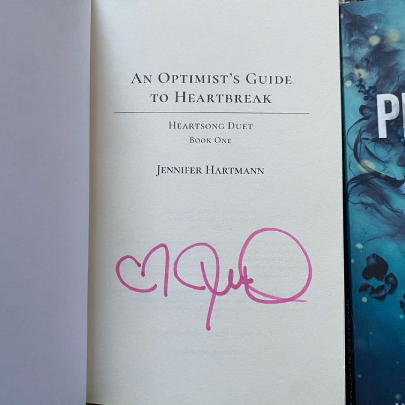 SIGNED an optimist’s guide to heartbreak & a pessimist’s to love