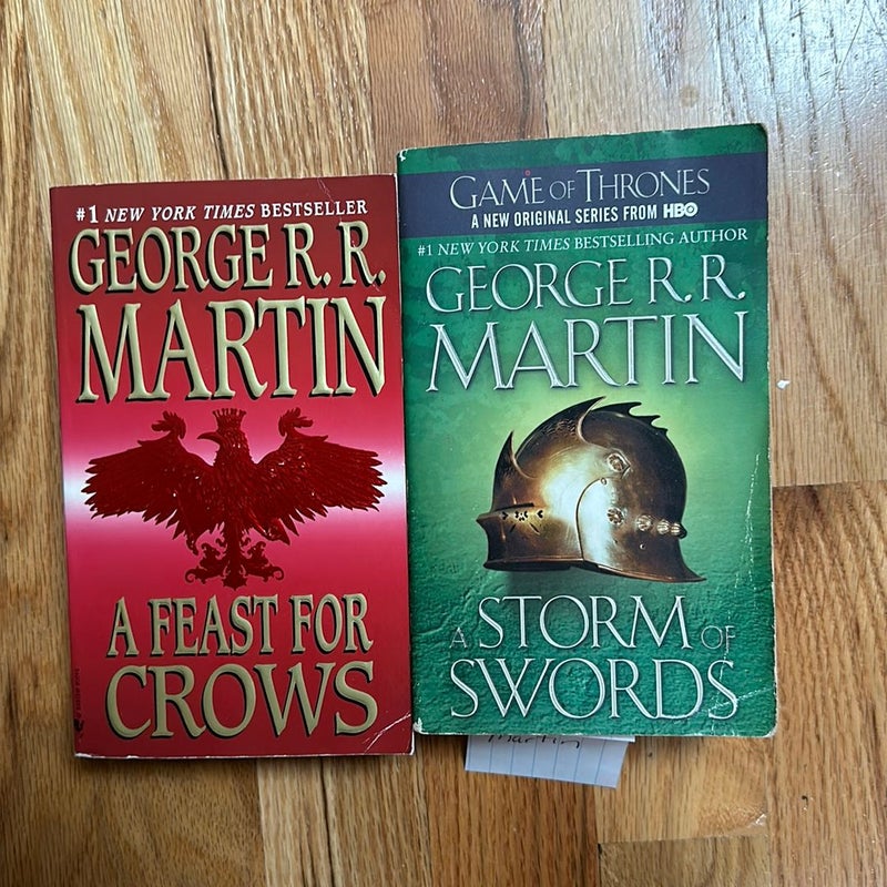 Lot of 2 - A Feast for Crows plus 1  more 
