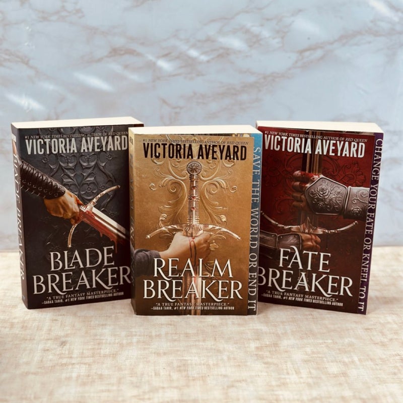 Realm Breaker trilogy with promo items