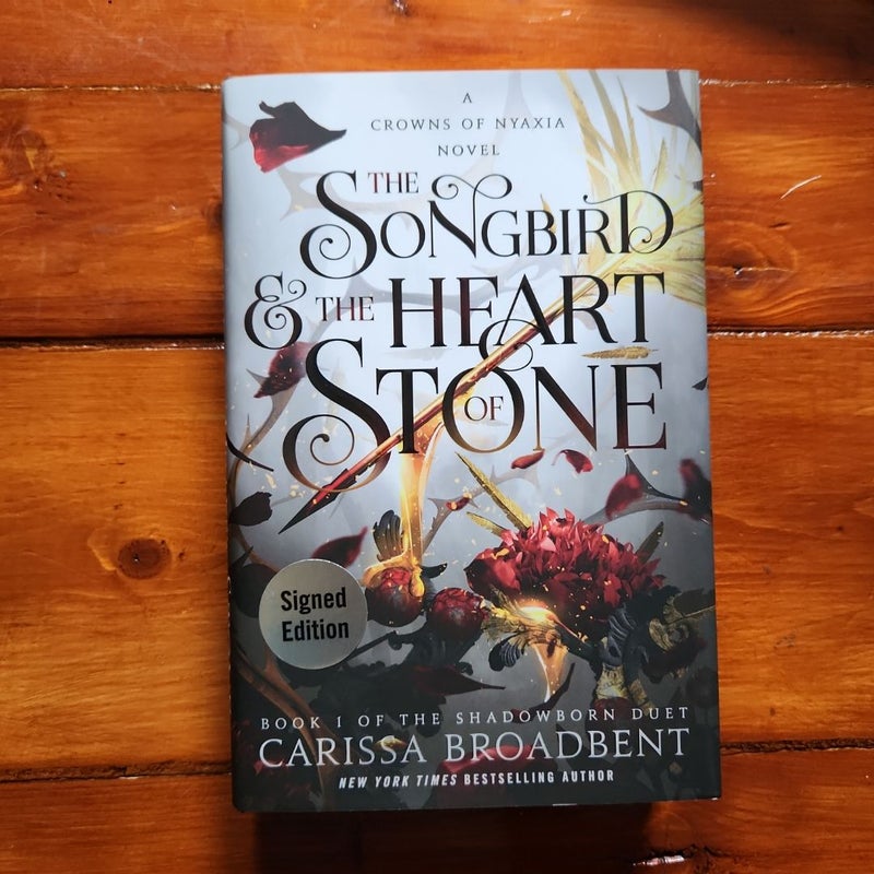 The Songbird and the Heart of Stone SIGNED