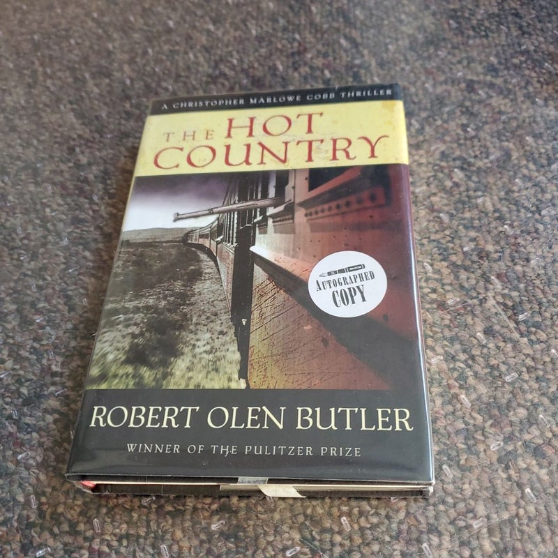The Hot Country (SIGNED)