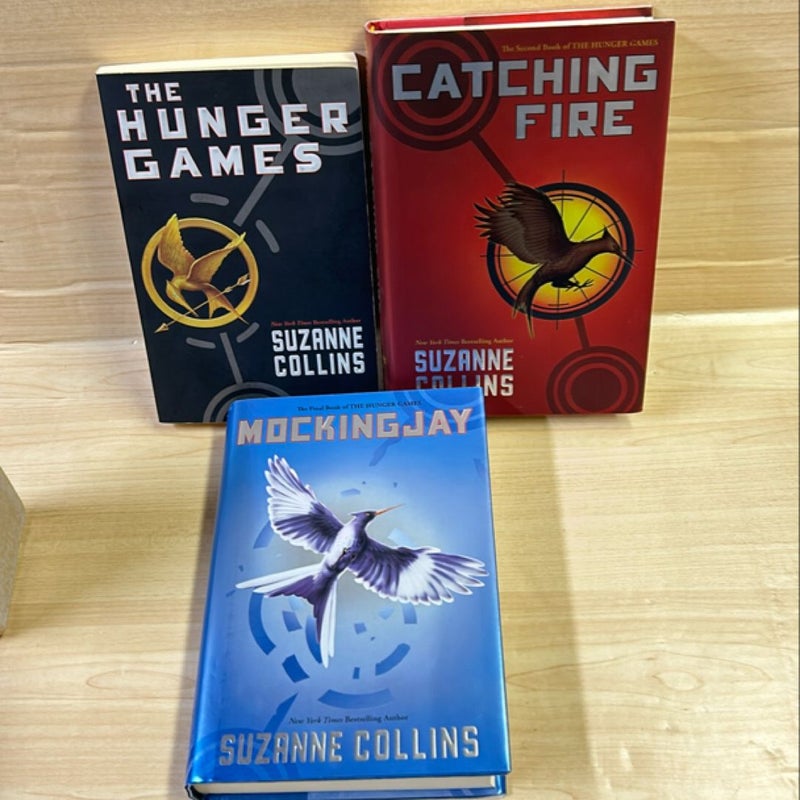 The Hunger Games Trilogy 1 Paperback and 2 Hardcover bundle