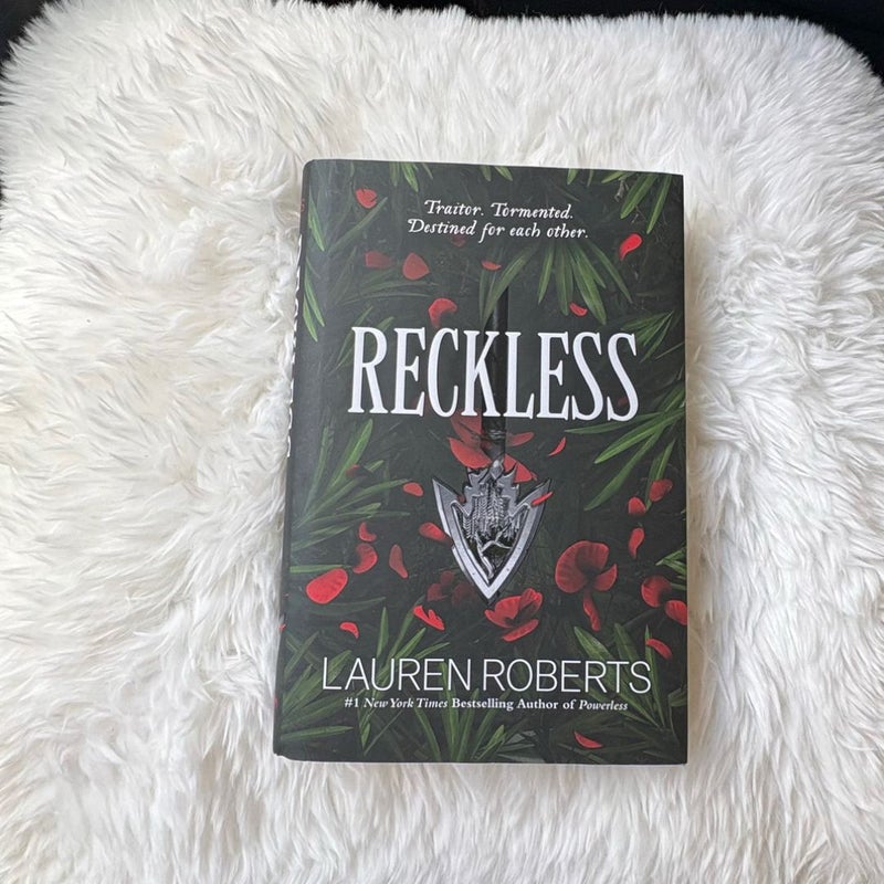 Two Hardback Books: Powerless + Reckless