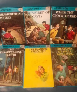 Hardy Boys books 6, 7, 11, 19, 26, 27 : the Shore Road Mystery, Secret of the Caves, While the Clock Ticked, Disappearing Floor, Phantom Freighter, Secret of Skull Mountain