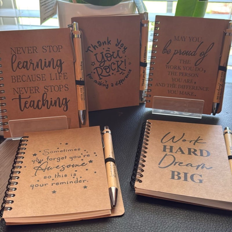 Notebooks & Pens!  Small inspirational matching notebooks and pens.