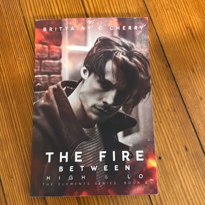 The Fire Between High and Lo (Signed)