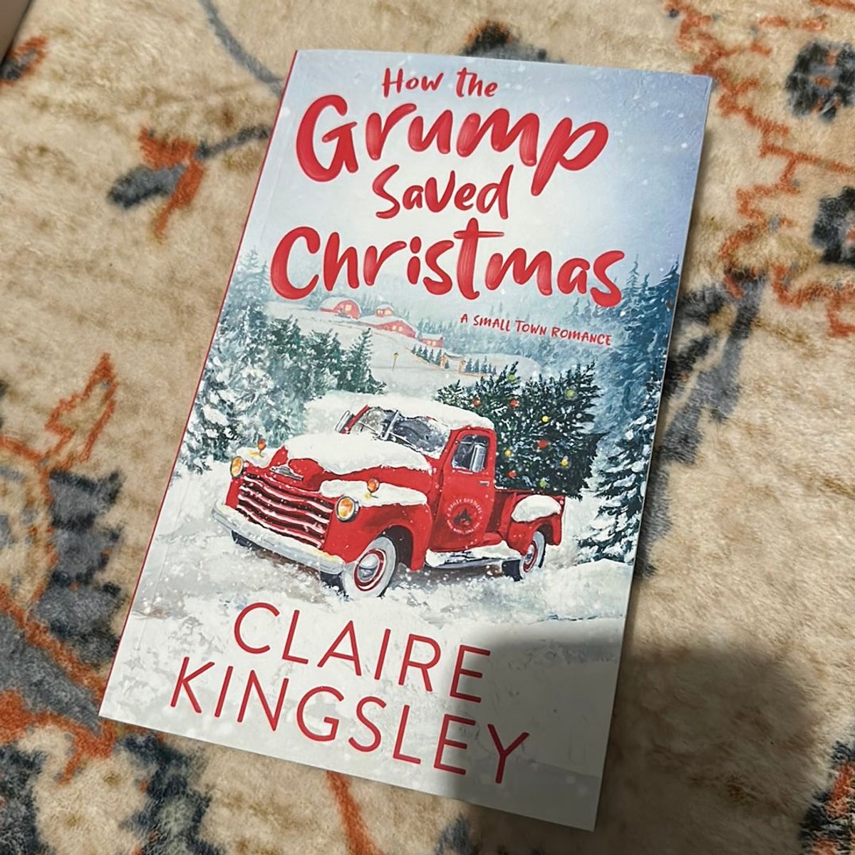 How the Grump Saved Christmas by Claire Kingsley