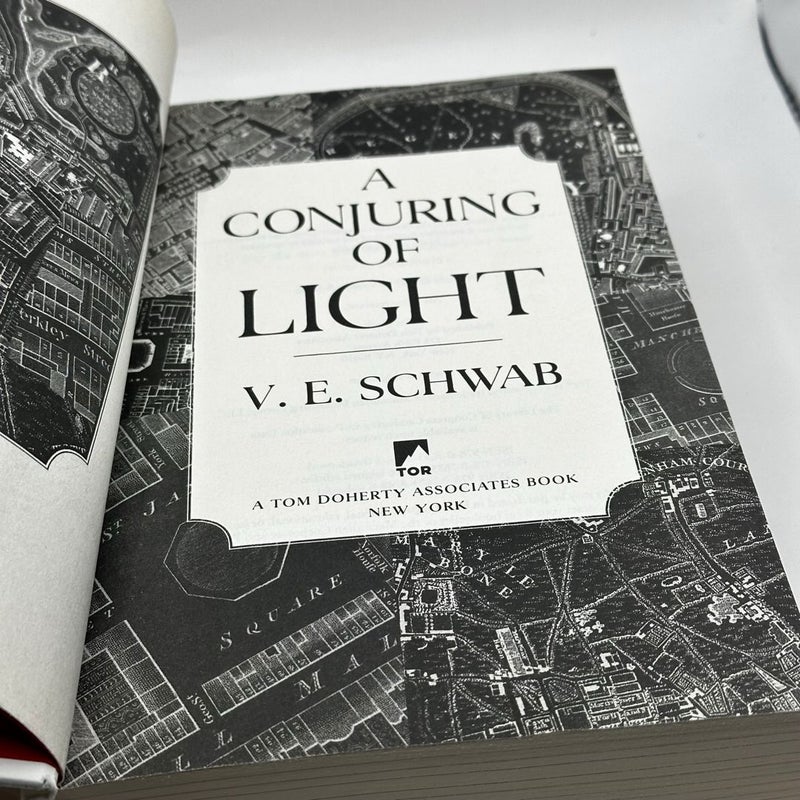 A Conjuring of Light (OOP white cover 1st/2nd)