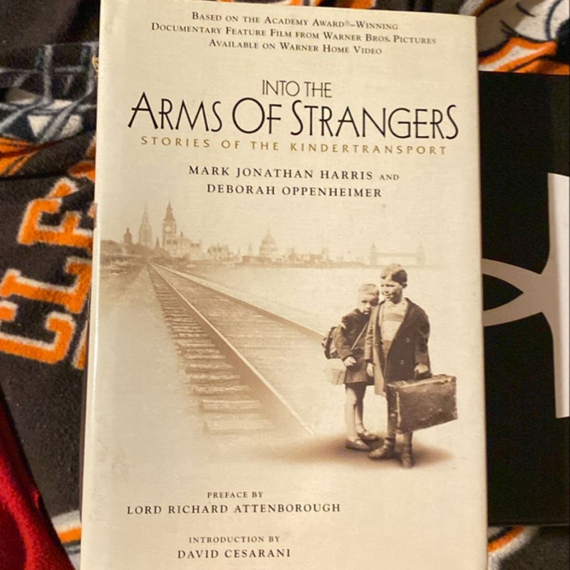 Into the Arms Of Strangers 
