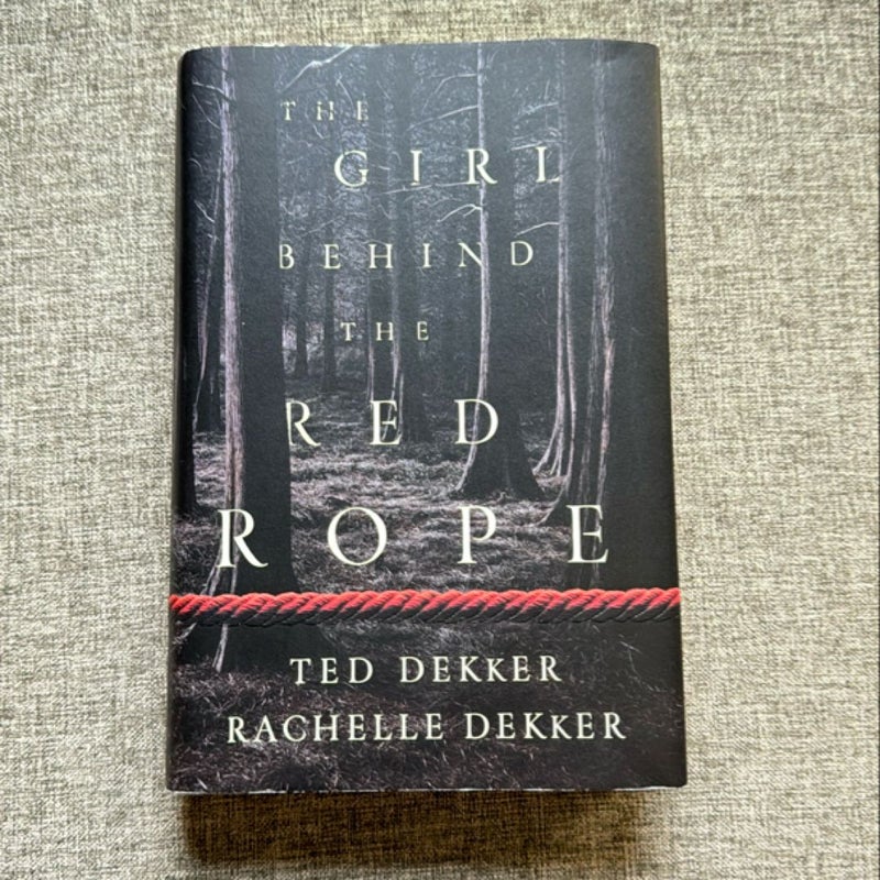 The Girl Behind the Red Rope