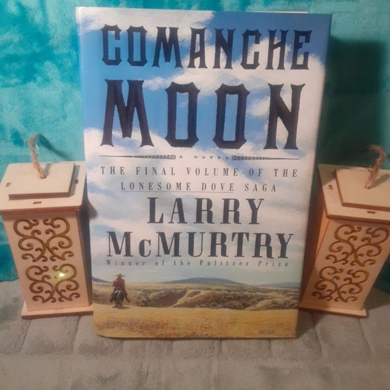 2 Hardcover Books By Larry McMurtry! Both with dust jackets. =0

~ Lonesome Dove : 2nd printing, with the page 621 typo Error! Book has some reading wear & age spots on top. In good shape.

~ Comanche Moon : 1st printing, some shelf wear & sticker remains on DJ. Pencil inscription on 1st page, in very good shape