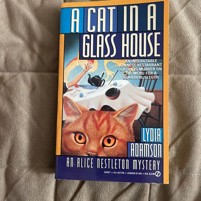 A Cat in a Glass House 815