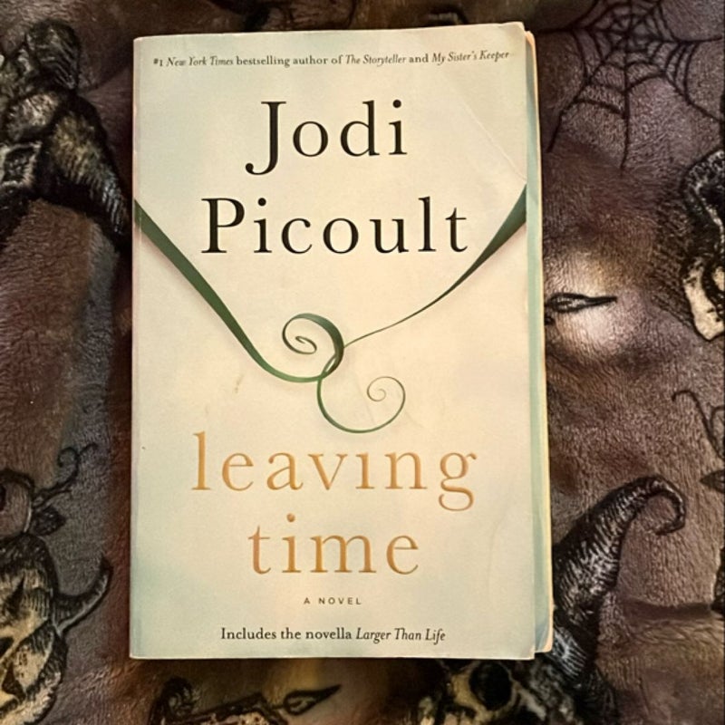 Leaving Time (with Bonus Novella Larger Than Life)