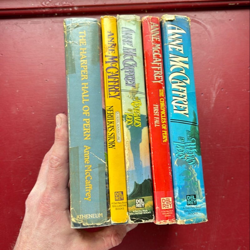 5 Hardcover Pern Books: first fall, renegades, Harper Hall of Pern, nerilka’s story, weyrs of pern. 