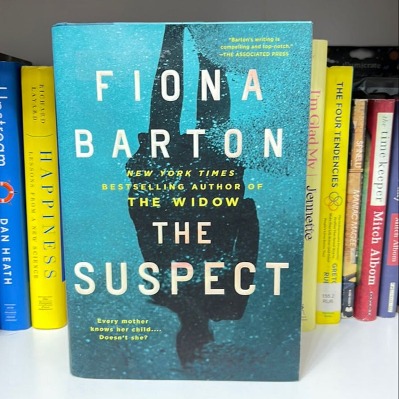 The Suspect (Ex Library Book)