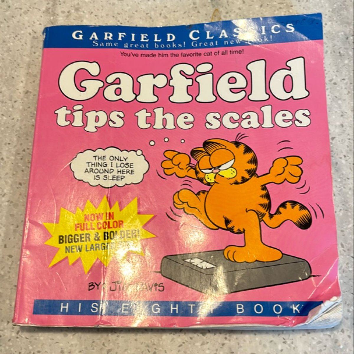 Garfield Tips the Scales by Jim Davis