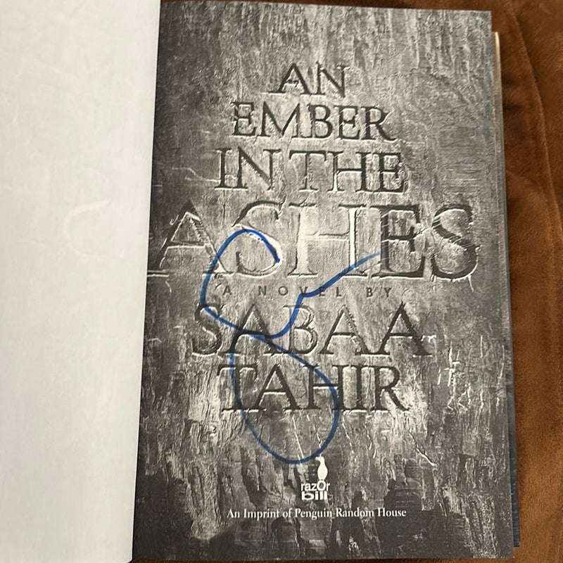 An Ember in the Ashes —Signed