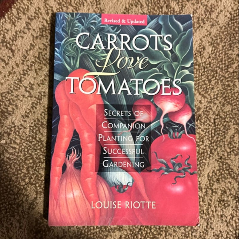 Carrots Love Tomatoes and Roses Love Garlic