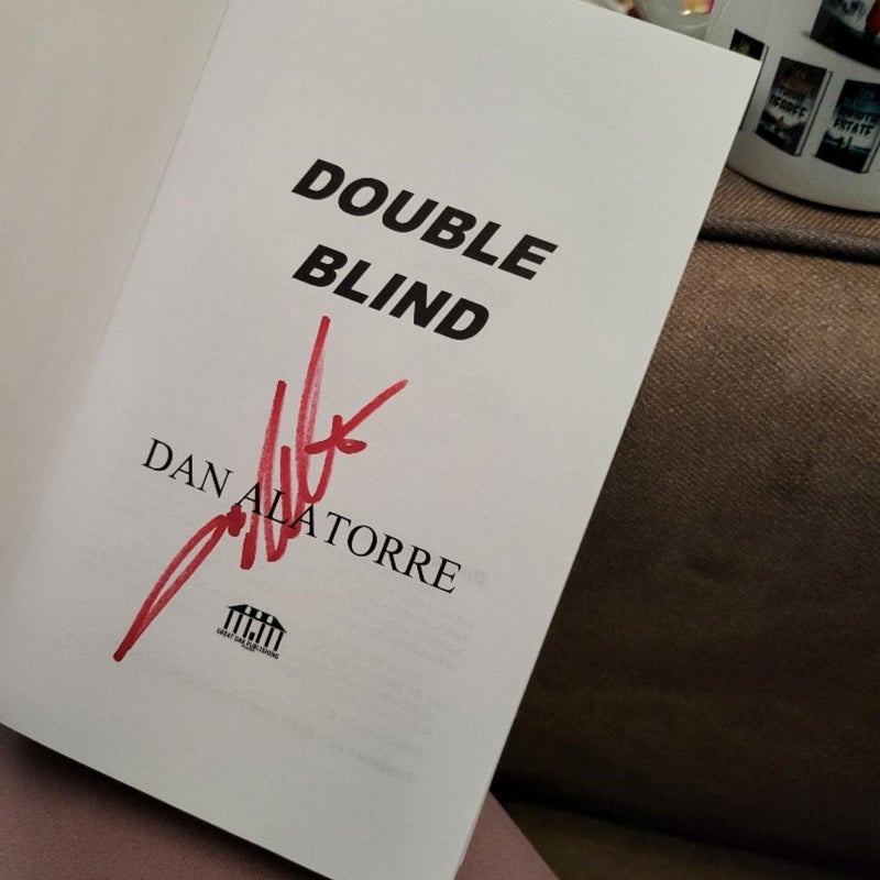 Signed copy double blind with matching coffee mug