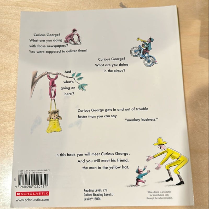 Curious George Rides a Bike