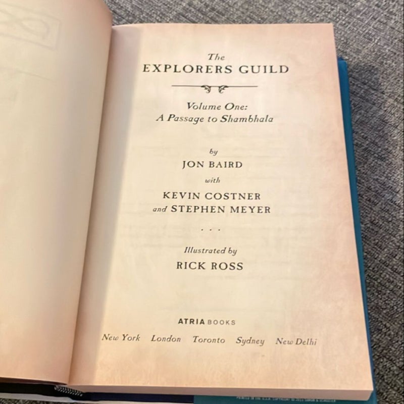 SIGNED The Explorers Guild (2015) First Printing by Kevin Costner, Jon Baird, and Rick Ross