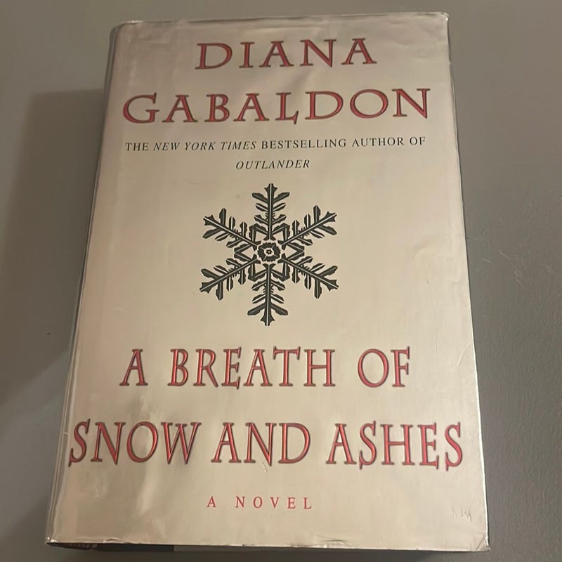 A Breath of Snow and Ashes (signed 1st edition)