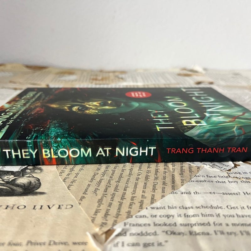 THEY BLOOM AT NIGHT BY TRANG THANH TRAN ( SHE IS A HAUNTING) - PAPERBACK ARC