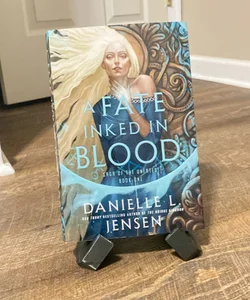A Fate Inked in blood, EMBOSSED dust jacket with metallic sprayed edges! 1st international edition 
