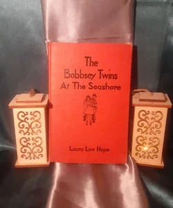 Bobbsey Twins book by Laura Lee Hope

'At the Seashore' hardcover from Goldsmith
