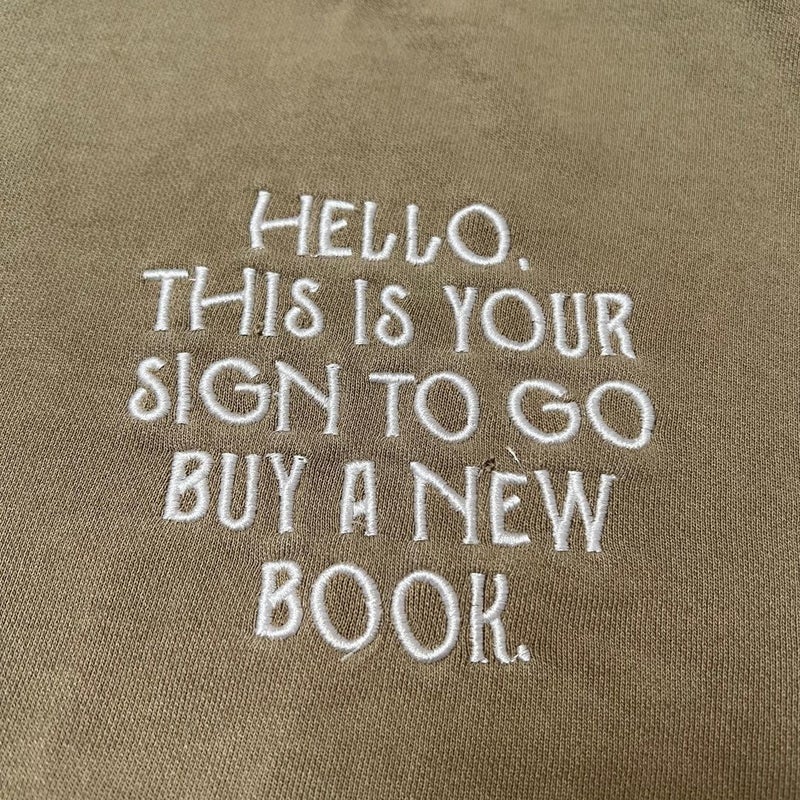 Book Babe Designs “Hello. This is Your Sign to Go Buy a Book” Oversized Crewneck