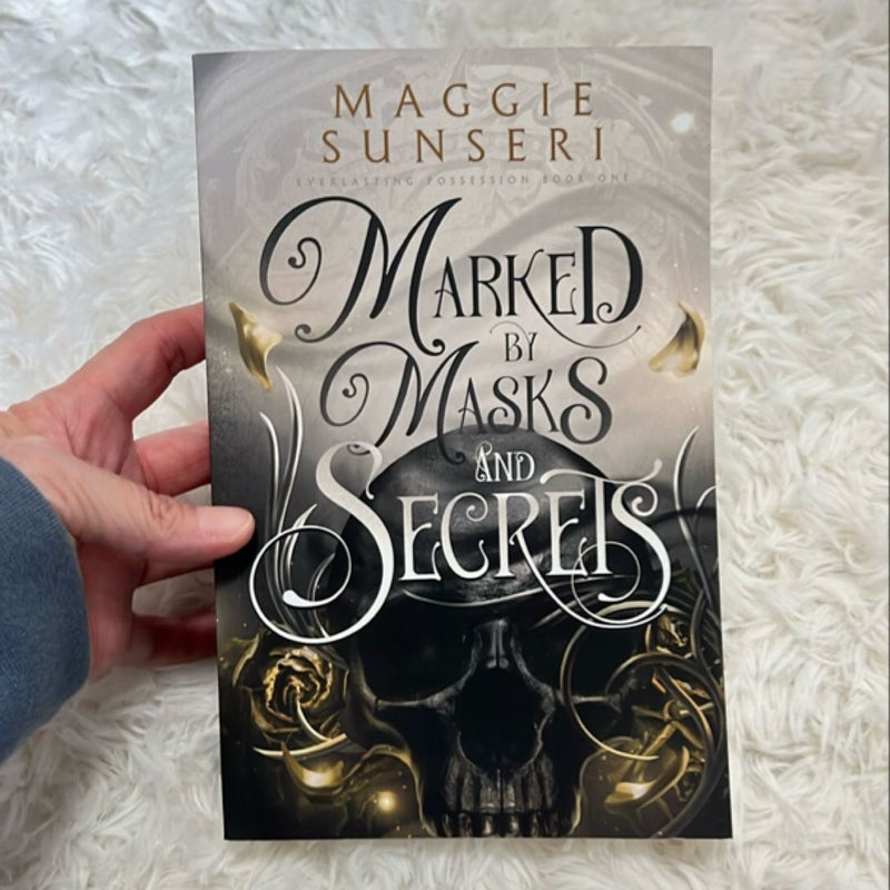 Marked by Masks and Secrets