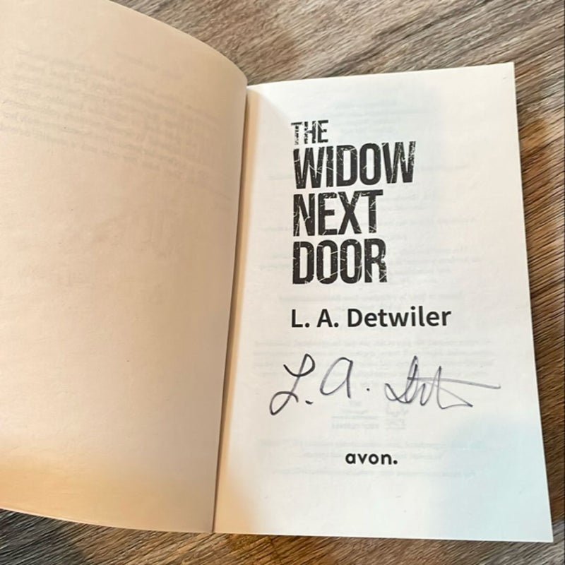 SIGNED The Widow Next Door