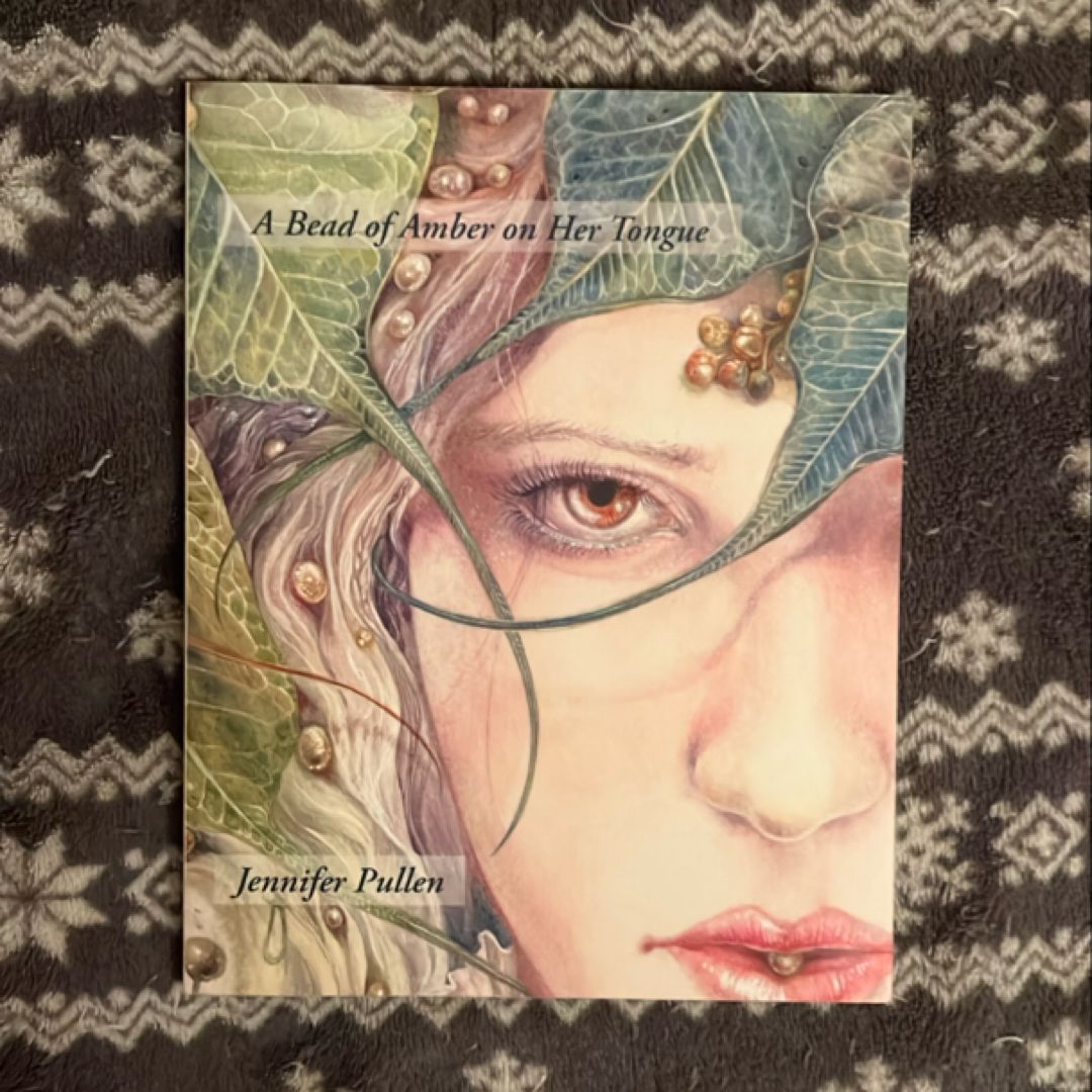 A Bead of Amber on Her Tongue