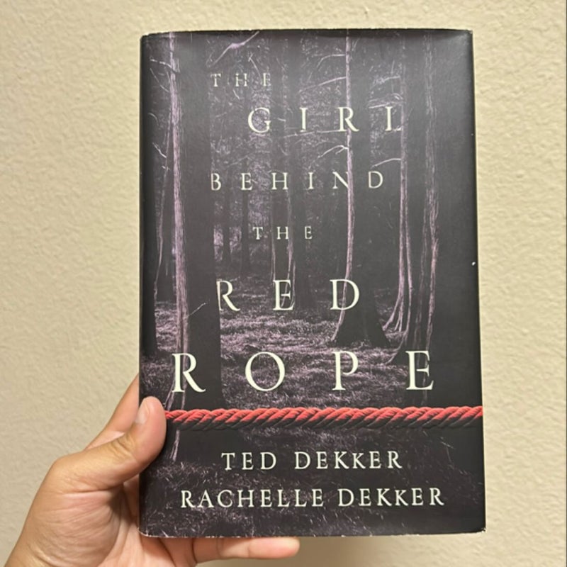 The Girl Behind the Red Rope