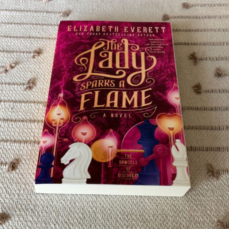 The Lady Sparks a Flame