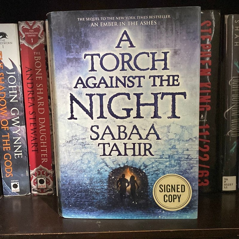 A Torch Against the Night (Signed copy)