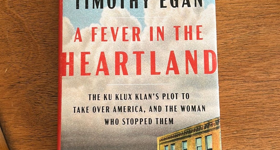 A Fever in the Heartland: The Ku Klux Klan's Plot to Take Over America, and  the Woman Who Stopped Them: Egan, Timothy: 9780735225268: : Books