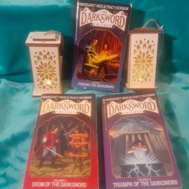 The Darksword Trilogy book Set by Margaret Weis, Forging the darksword , Doom of the dark sword, Triumph of the darksword, all 1st Editions