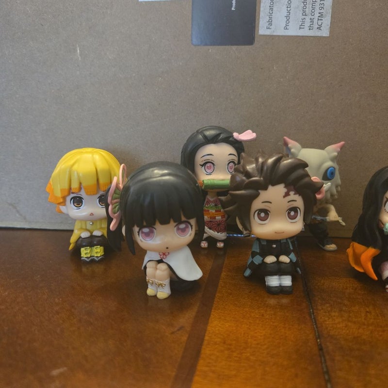 Demon Slayer Book Lot with 8 figurines