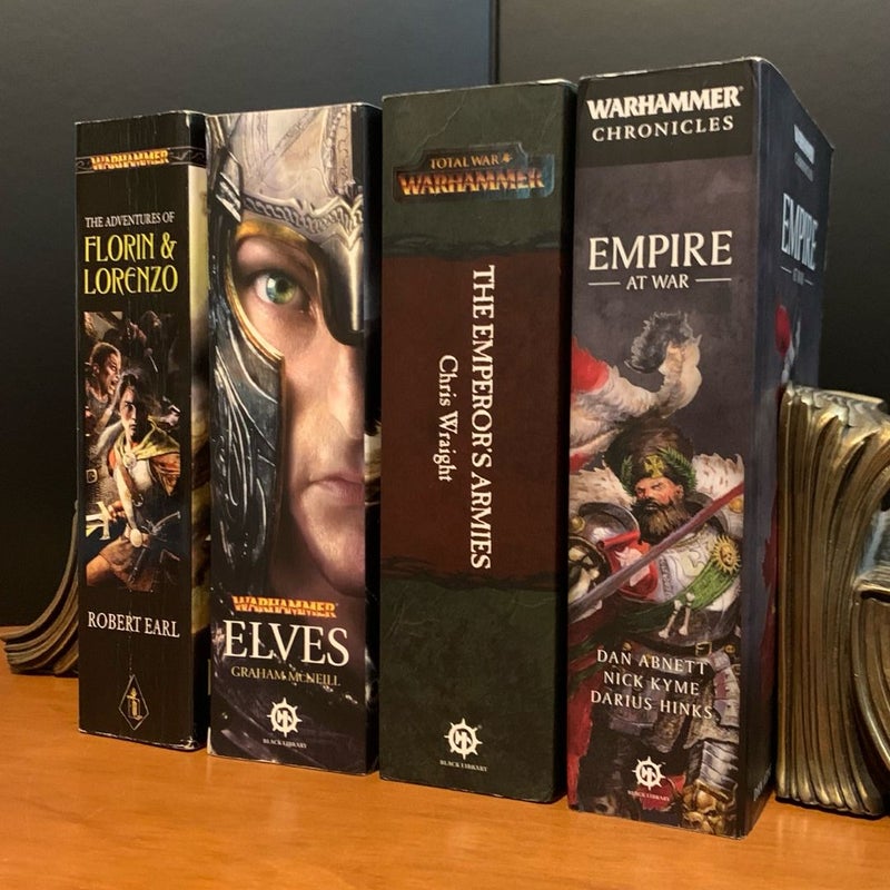 Warhammer Fantasy Omnibus Set: The Adventure of Florin & Lorenzo, Elves, The Emperor’s Armies, Empire at War: Contains the Novels: The Burning Shore, Wild Kingdoms, Savage City, Defenders of Ulthuan, Sons of Ellyrion, Guardians of the Forest, Sword of Vengeance, Sword of Justice, Riders of the Dead, Grimblades, Warrior Priest, Swords of the Empire, and many short stories
