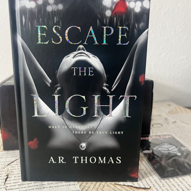 Romance cartel exclusive, escape the light by AR Thomas.