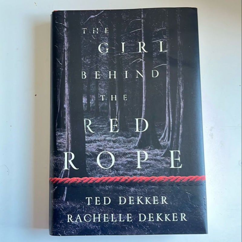 The Girl Behind the Red Rope