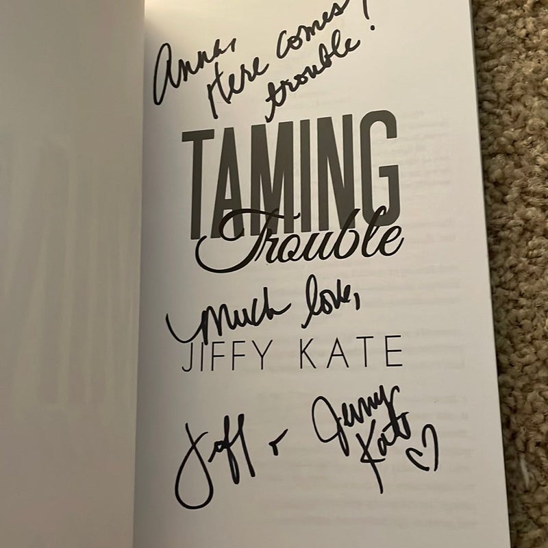 Taming Trouble (signed by both authors)
