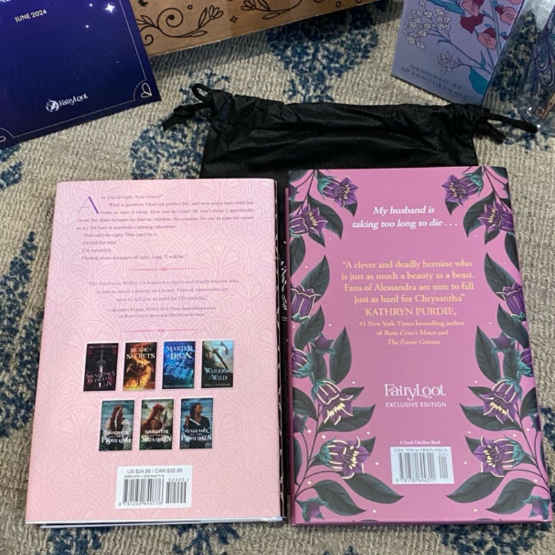 The Darkness Within Us Fairyloot book & water bottle and the First Edition book