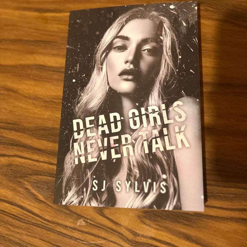 Dead girls never talk by SJ Sylvis