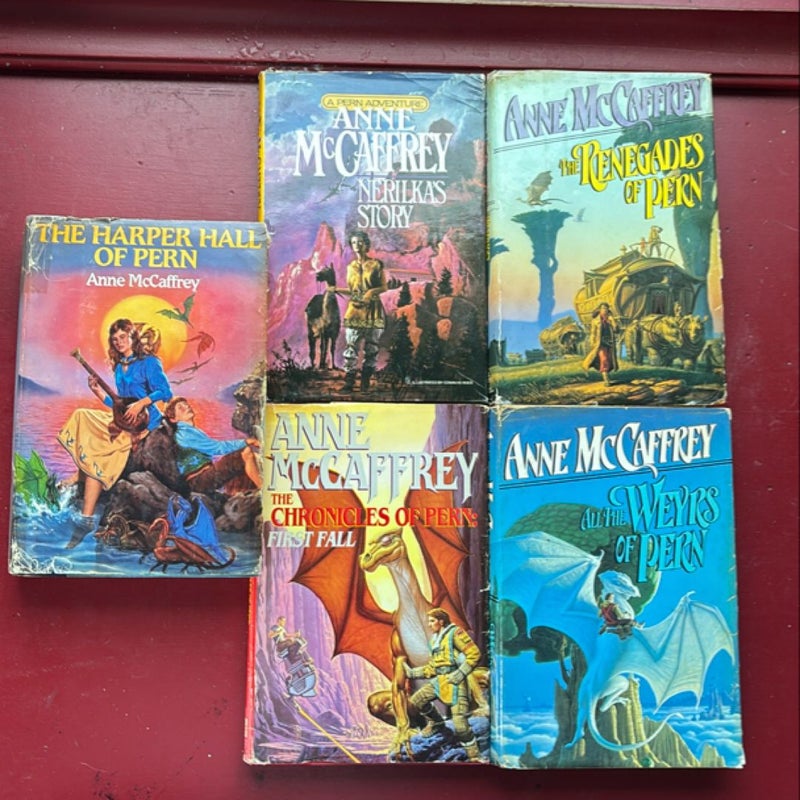 5 Hardcover Pern Books: first fall, renegades, Harper Hall of Pern, nerilka’s story, weyrs of pern. 