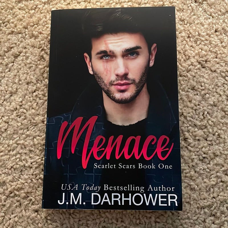 Menace (signed by the author)