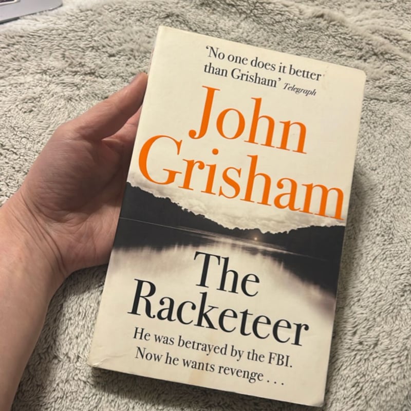 The Racketeer by John Grisham, Paperback | Pangobooks