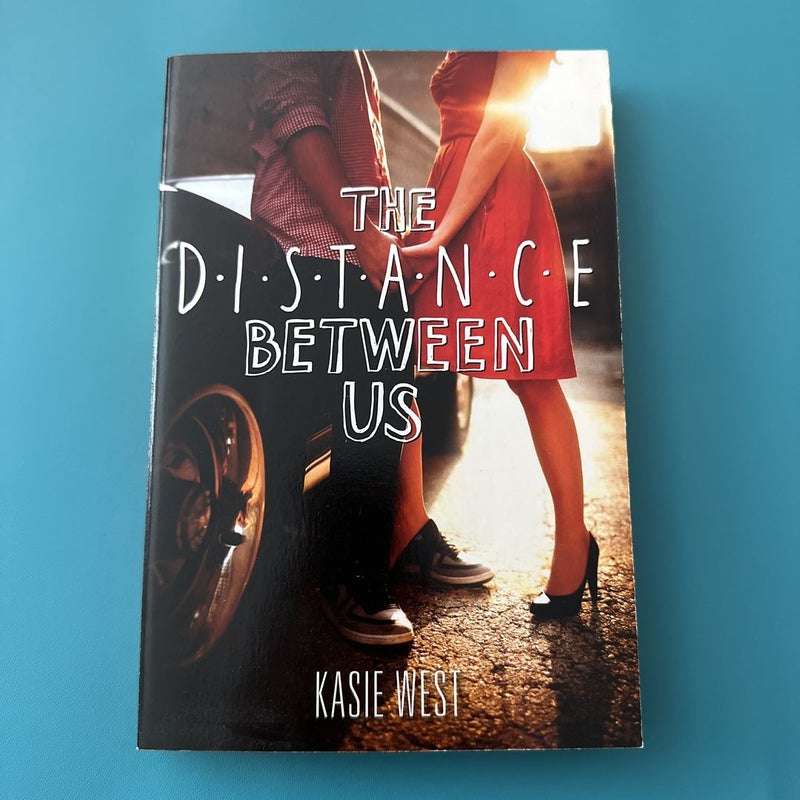 The Distance Between Us (Signed by author)