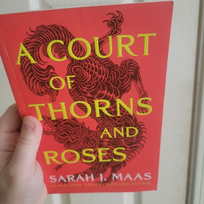 A Court of Thorns and Roses, A Court of Mist and Fury, & A Court of Wings and Ruin